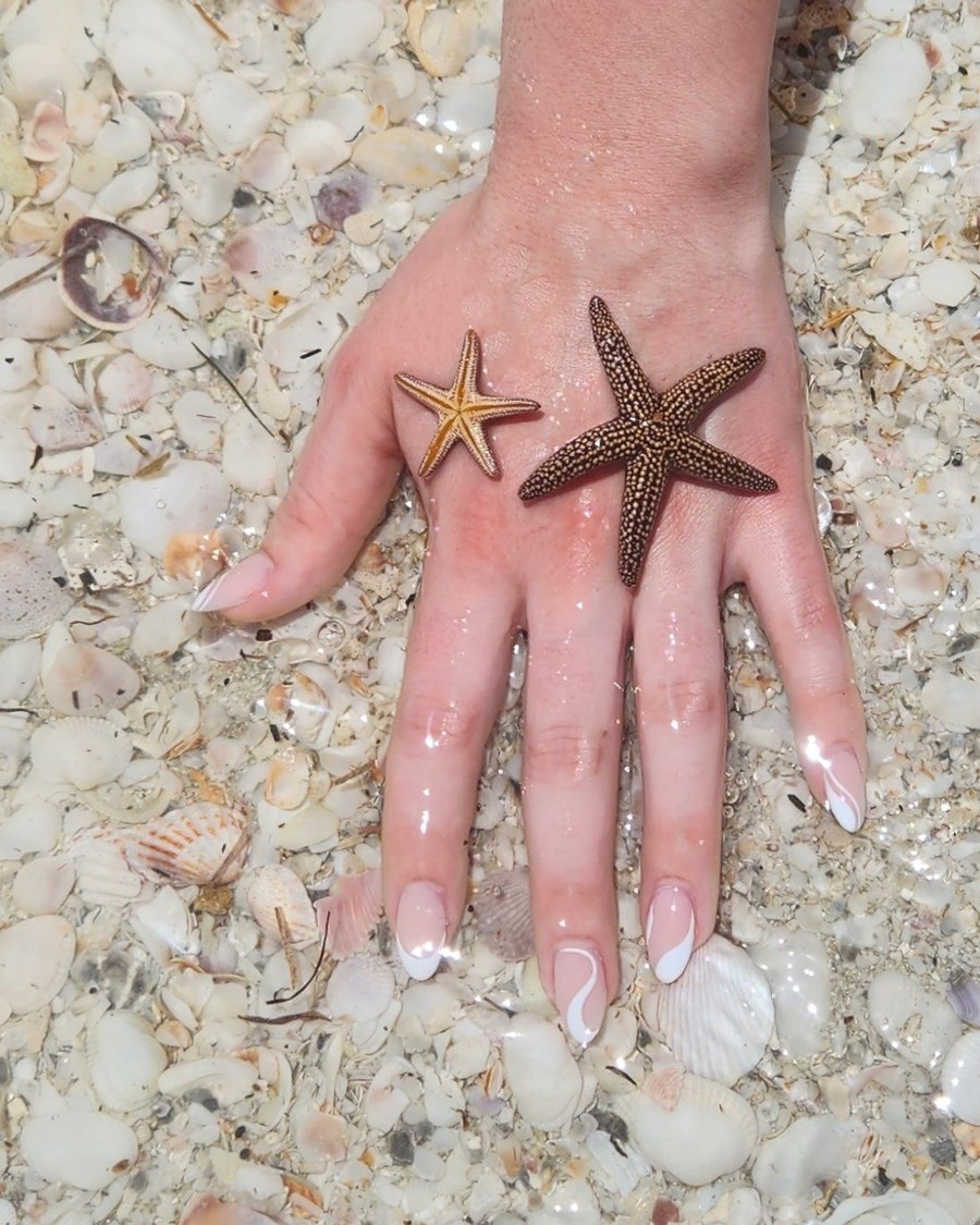 French-tip nails by Ovora Atelier